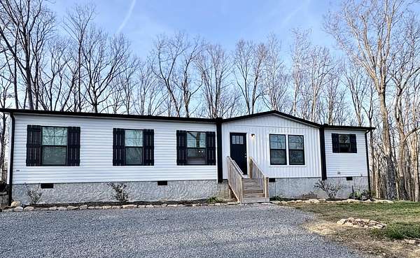 2 Acres of Land with Home for Sale in Graysville, Tennessee