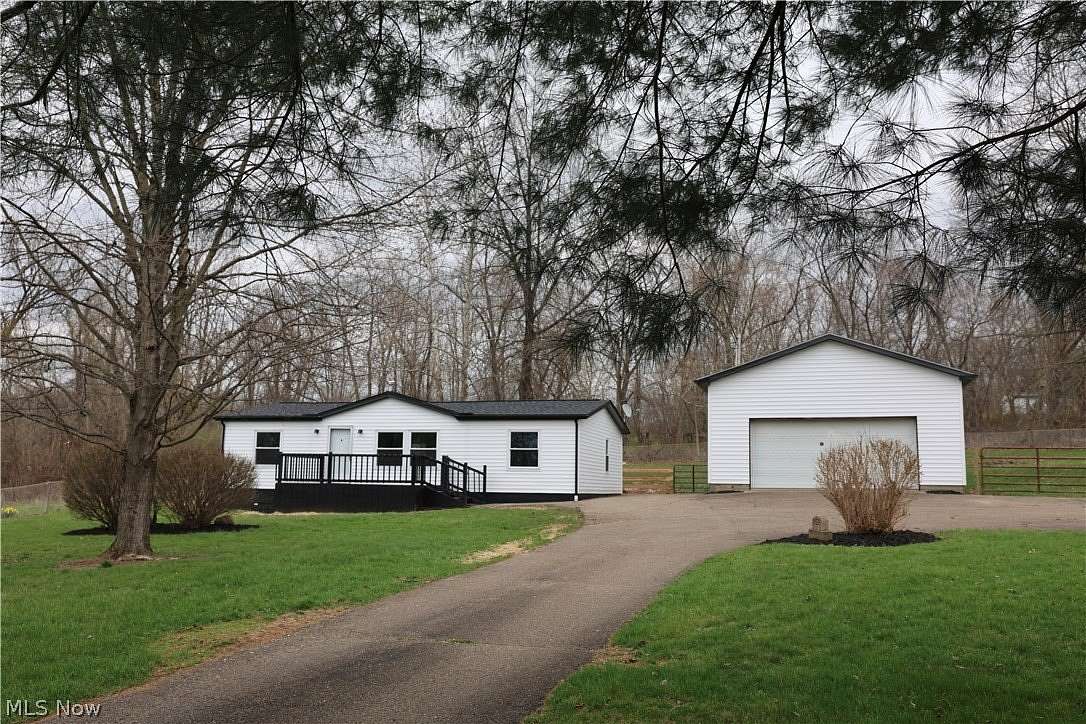 1.5 Acres of Land with Home for Sale in Millersburg, Ohio