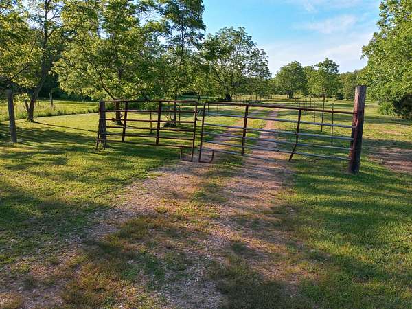 12.4 Acres of Land with Home for Sale in Pomona, Missouri