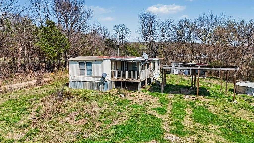 3.84 Acres of Land with Home for Sale in Summers, Arkansas