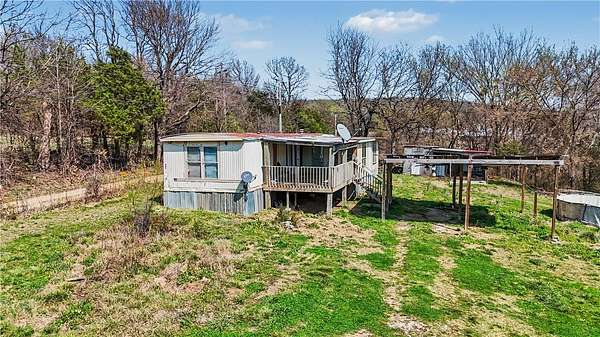 3.84 Acres of Land with Home for Sale in Summers, Arkansas