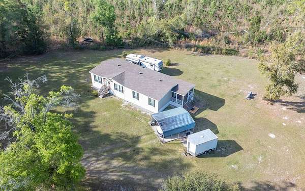 14 Acres of Land with Home for Sale in Live Oak, Florida