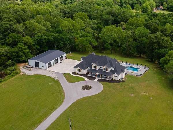 10.4 Acres of Land with Home for Sale in Fayetteville, Arkansas