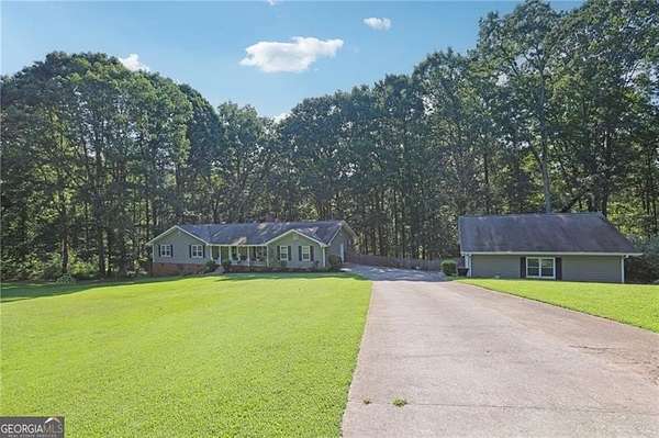 2.75 Acres of Land with Home for Sale in Conyers, Georgia