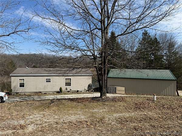 7.5 Acres of Land with Home for Sale in Lincoln, Missouri