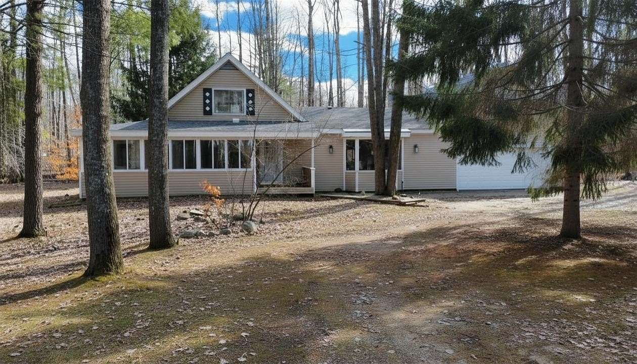 5 Acres of Land with Home for Sale in Harrison, Michigan