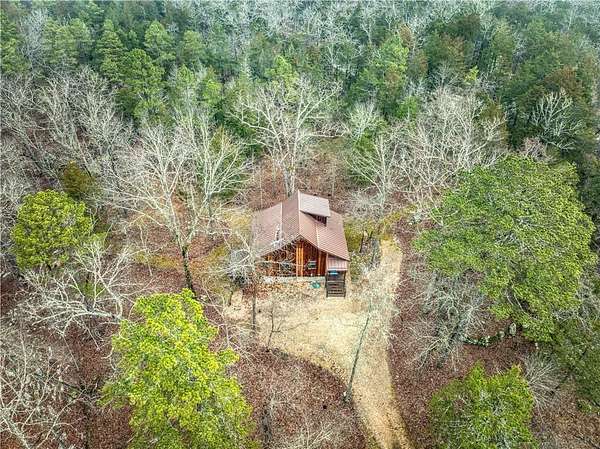 17.2 Acres of Land with Home for Sale in Marble Falls Township, Arkansas