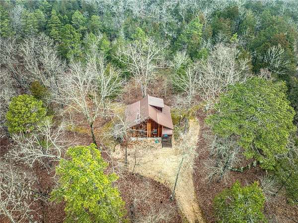 17.2 Acres of Land with Home for Sale in Marble Falls Township, Arkansas