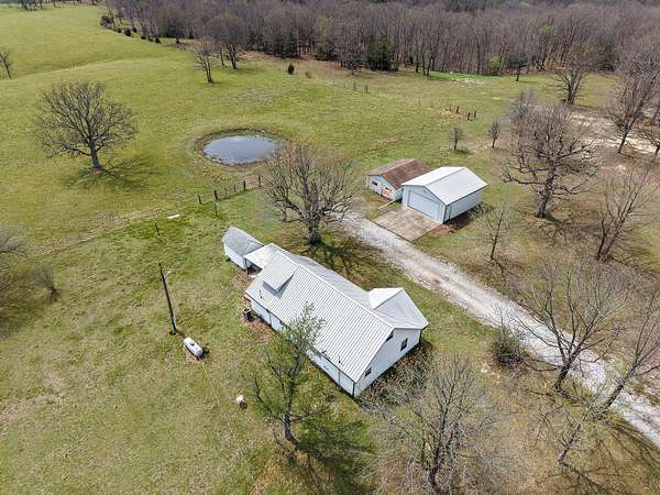 34.6 Acres of Recreational Land with Home for Sale in Aurora, Missouri