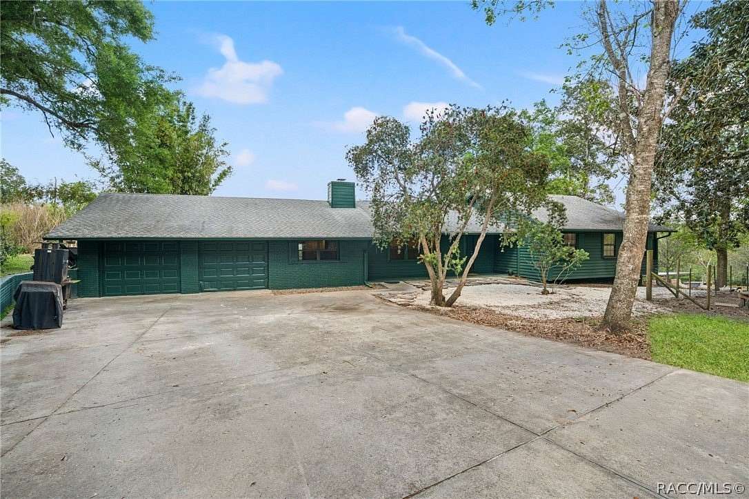 4.7 Acres of Land with Home for Sale in Brooksville, Florida