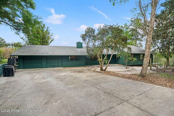 4.7 Acres of Land with Home for Sale in Brooksville, Florida