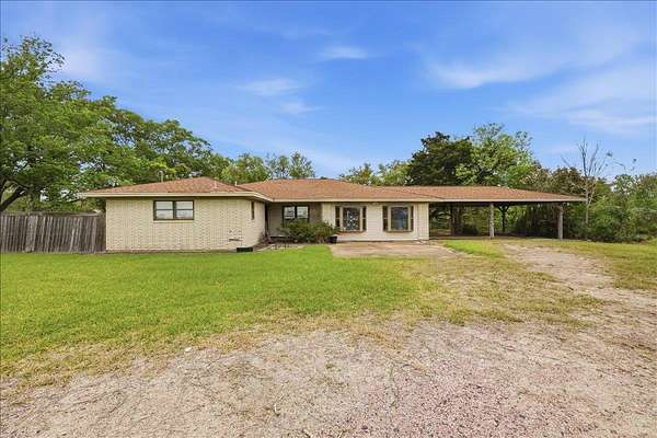 2.75 Acres of Land with Home for Sale in Hamshire, Texas