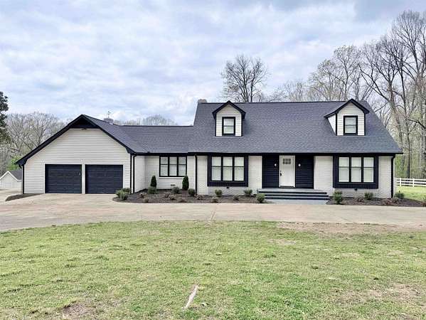 9 Acres of Land with Home for Sale in Mercer, Tennessee