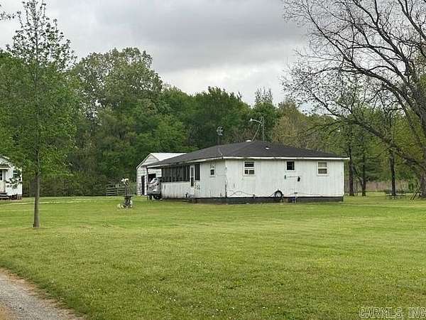 82.4 Acres of Land with Home for Sale in Carlisle, Arkansas