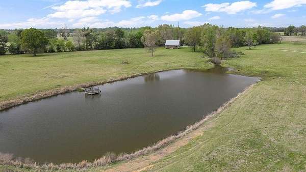 33 Acres of Agricultural Land with Home for Sale in Mount Enterprise, Texas