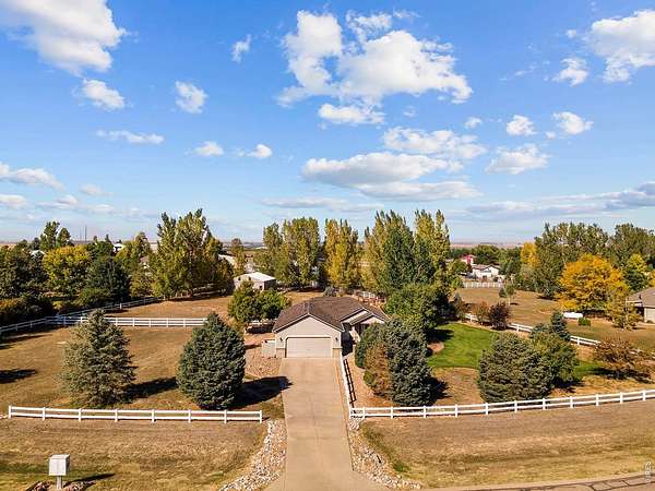 1.68 Acres of Land with Home for Sale in Milliken, Colorado