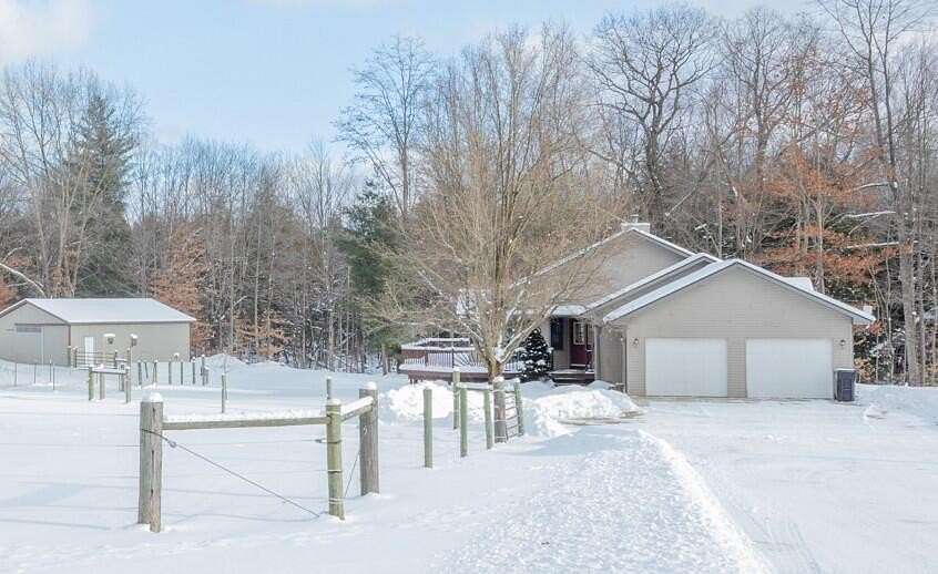 10 Acres of Land with Home for Sale in Stanwood, Michigan