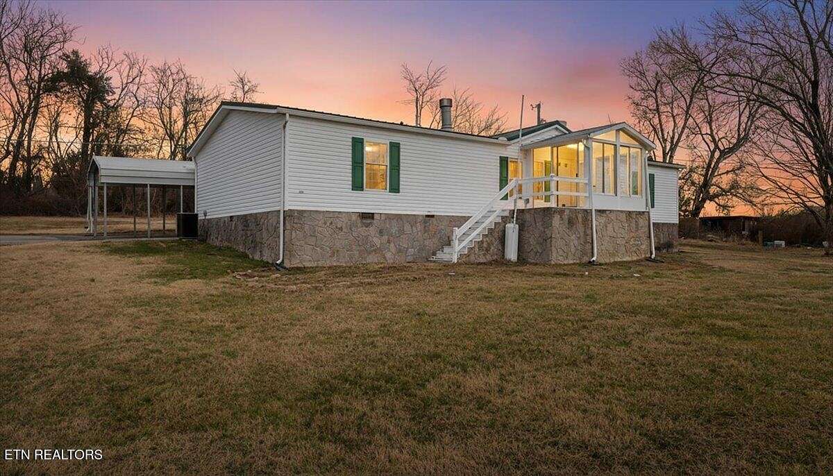 1.57 Acres of Land with Home for Sale in Friendsville, Tennessee