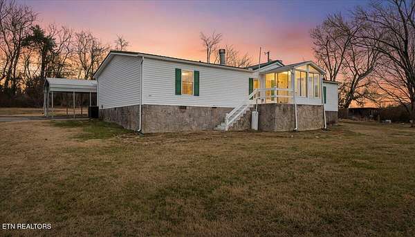1.57 Acres of Land with Home for Sale in Friendsville, Tennessee