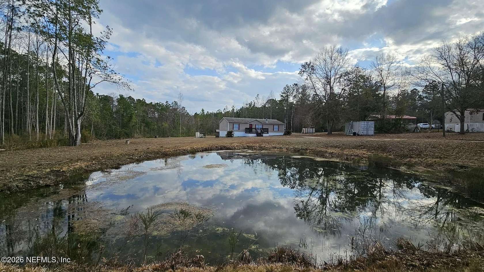 2.79 Acres of Land with Home for Sale in Hilliard, Florida