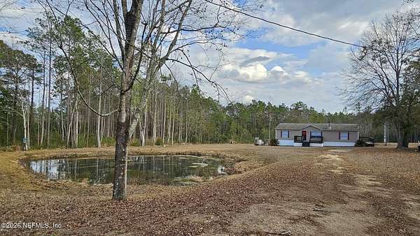 2.79 Acres of Land with Home for Sale in Hilliard, Florida