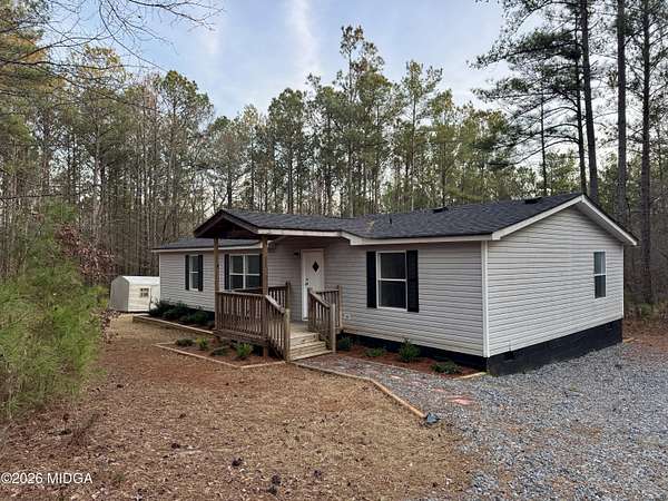 9.19 Acres of Land with Home for Sale in Forsyth, Georgia