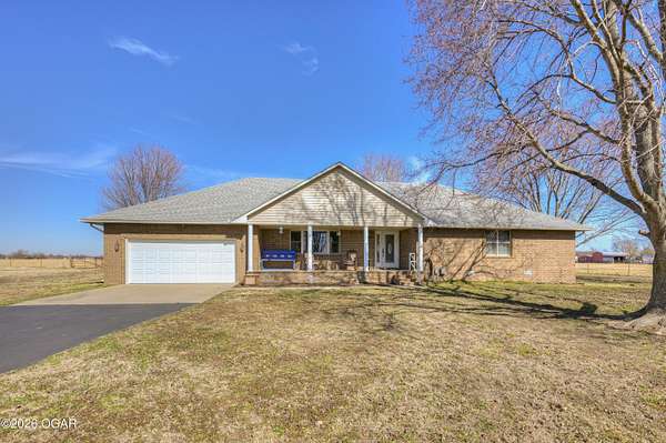 18 Acres of Land with Home for Sale in Carthage, Missouri