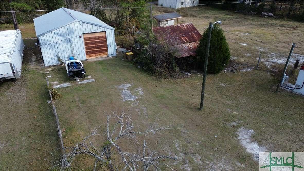 0.5 Acres of Improved Commercial Land for Sale in Ellabell, Georgia