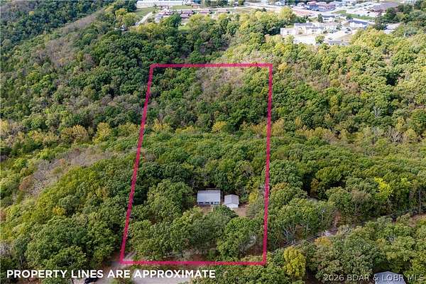 4.36 Acres of Land with Home for Sale in Camdenton, Missouri