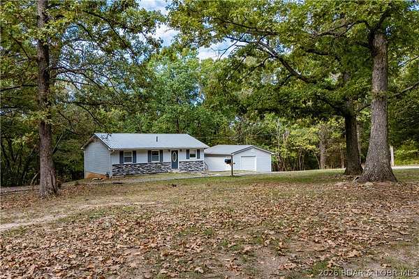 4.36 Acres of Land with Home for Sale in Camdenton, Missouri