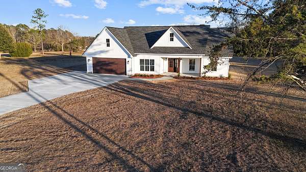 1.58 Acres of Land with Home for Sale in Odum, Georgia