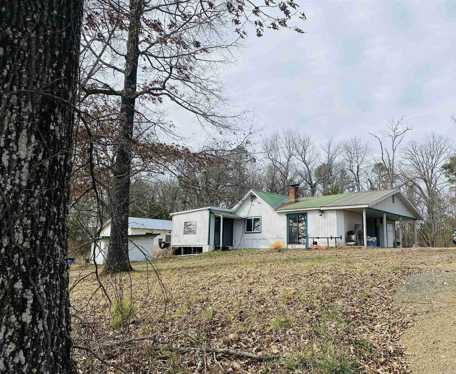 80.4 Acres of Land with Home for Sale in Hatfield, Arkansas