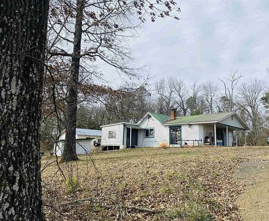 80.4 Acres of Land with Home for Sale in Hatfield, Arkansas