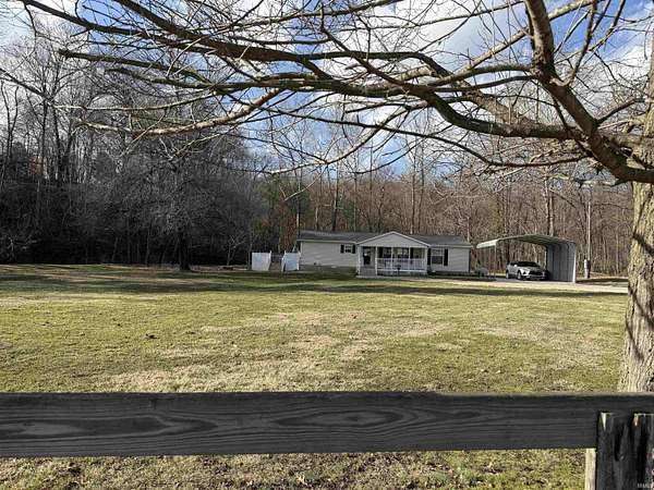 2.5 Acres of Land with Home for Sale in Heltonville, Indiana