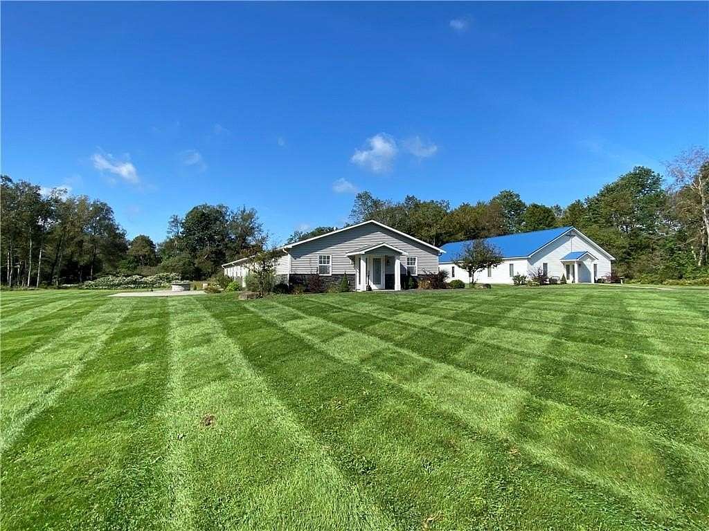 5.49 Acres of Improved Commercial Land for Sale in Morris, New York