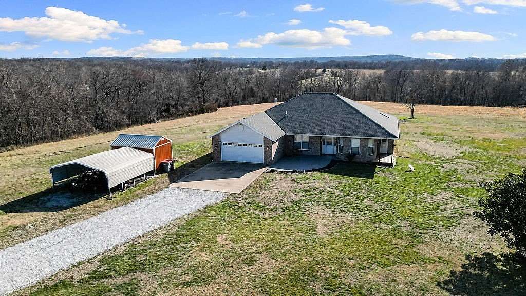 24.1 Acres of Agricultural Land with Home for Sale in Garfield, Arkansas