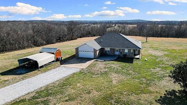 24.1 Acres of Agricultural Land with Home for Sale in Garfield, Arkansas