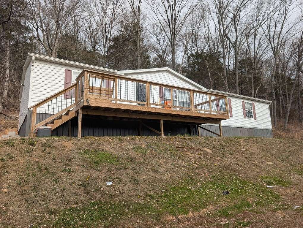5 Acres of Land with Home for Sale in Alpena, Arkansas