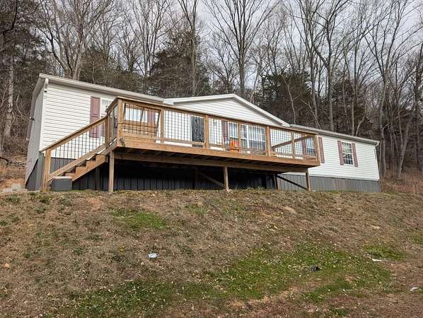 5 Acres of Land with Home for Sale in Alpena, Arkansas