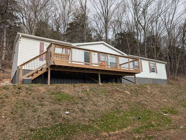 5 Acres of Land with Home for Sale in Alpena, Arkansas