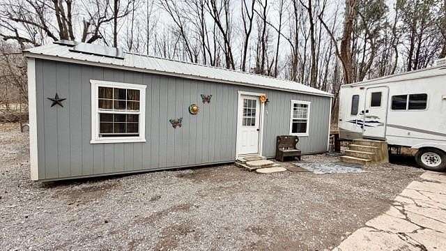 4 Acres of Land with Home for Sale in Providence, Kentucky