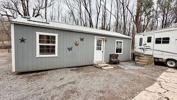 4 Acres of Land with Home for Sale in Providence, Kentucky