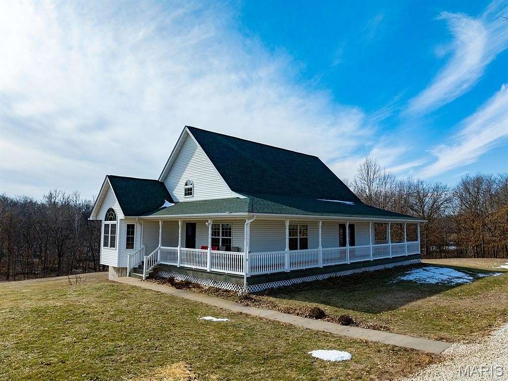 64.2 Acres of Recreational Land with Home for Sale in Bowling Green, Missouri