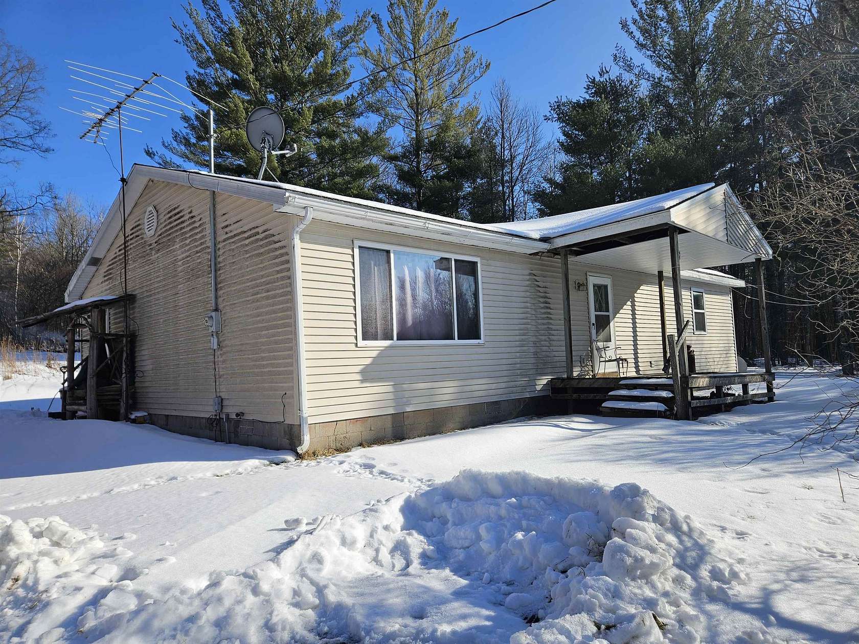 6.67 Acres of Land with Home for Sale in Harrison, Michigan