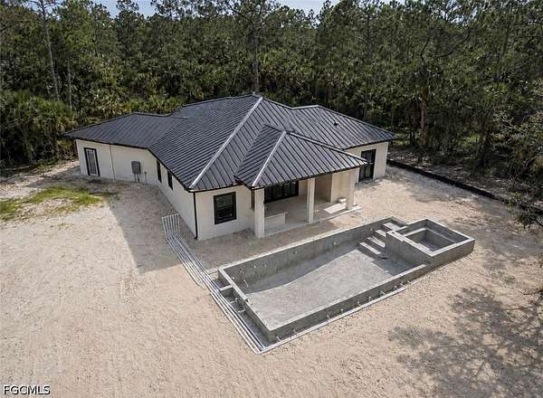 2.27 Acres of Land with Home for Sale in Naples, Florida