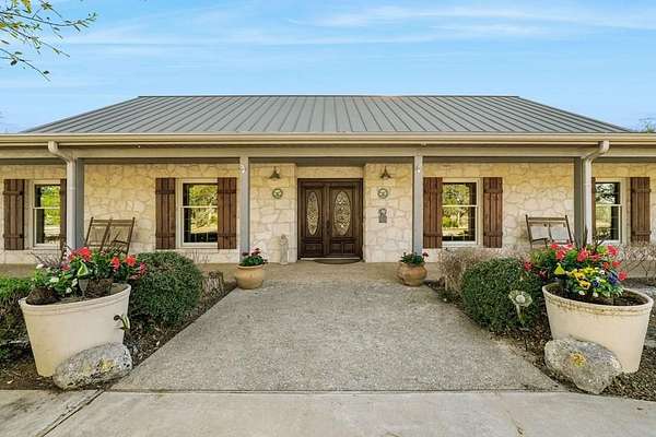 60.7 Acres of Land with Home for Sale in Center Point, Texas