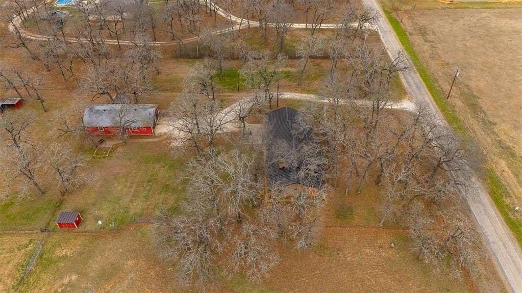6.89 Acres of Land with Home for Sale in Grandview, Texas