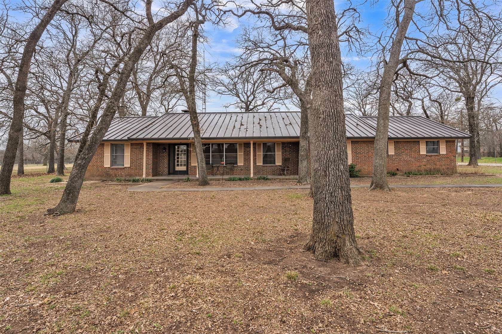 6.89 Acres of Land with Home for Sale in Grandview, Texas