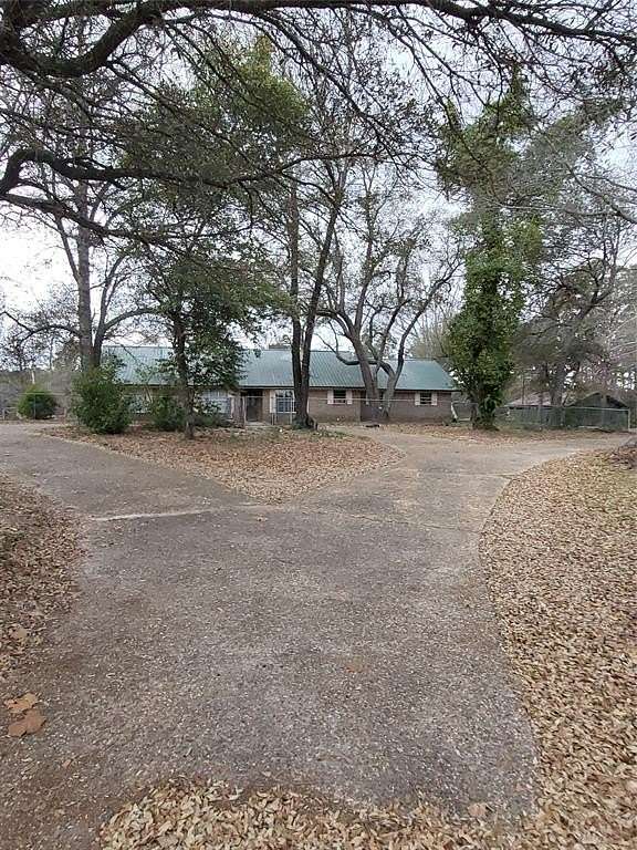 4.56 Acres of Land with Home for Sale in Vivian, Louisiana