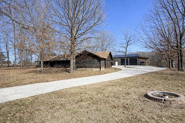 19.4 Acres of Land with Home for Sale in Halfway, Missouri